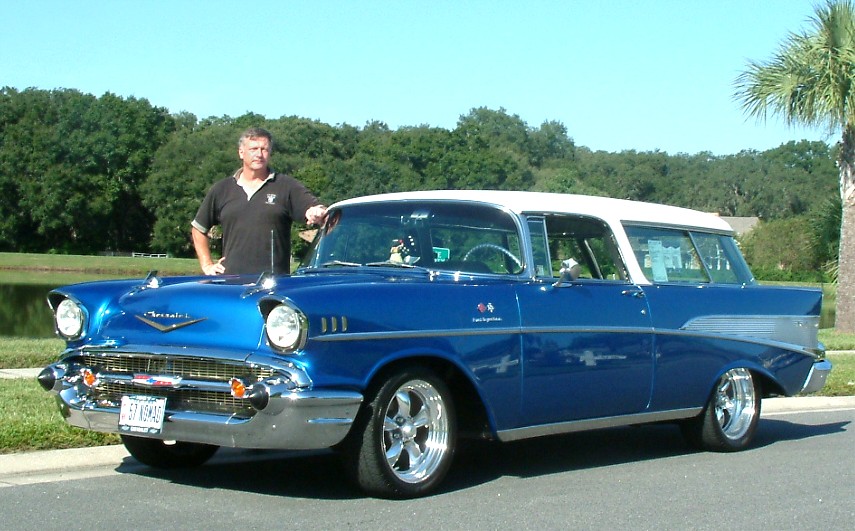 A glistening bright blue 1957 Chevrolet Nomad owned by Col